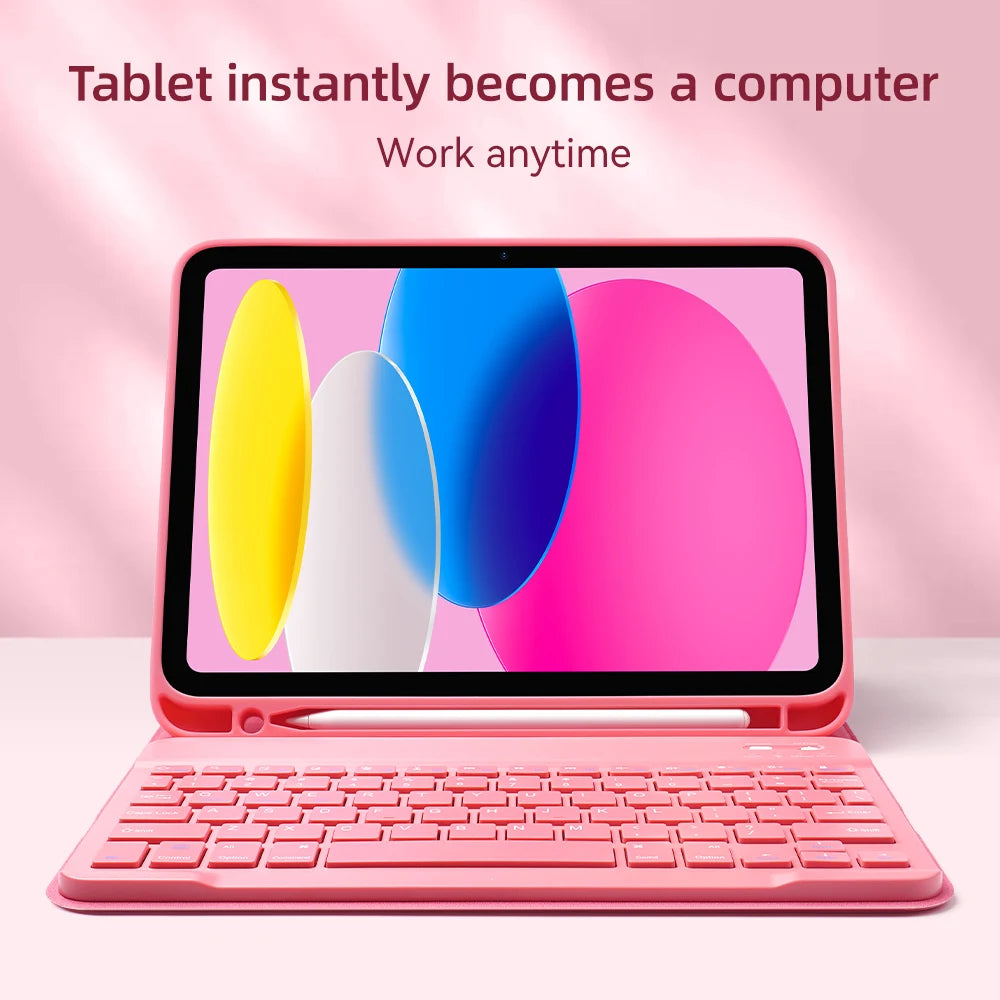 A pink tablet computer with a keyboard is shown, displaying colorful graphics on the screen.