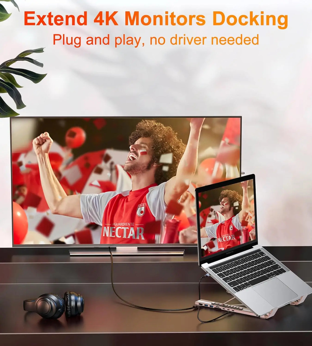 A laptop is connected to a 4K monitor via a docking solution, demonstrating plug and play monitor extension.