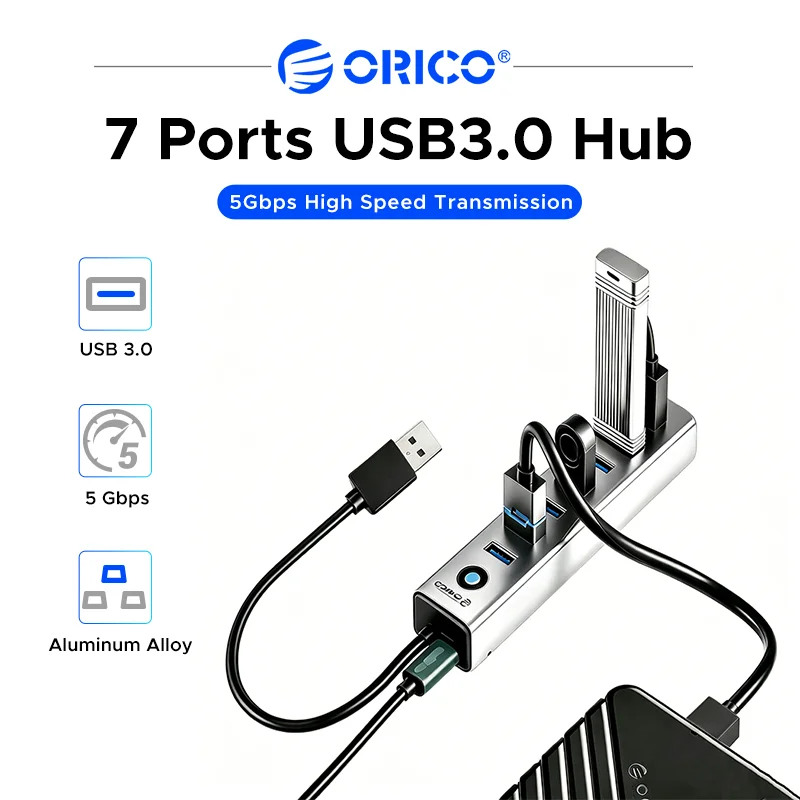 A silver USB 3.0 hub with seven ports and an aluminum alloy shell connected to a device.