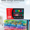 A box of acrylic brush markers and a large set of colorful paint pens are displayed on a white surface.