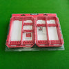 A clear plastic case containing multiple red impact driver accessory storage trays.