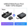 Black USB 3.0 hub with a power port and an OTG adapter connected to a Type-C adapter.
