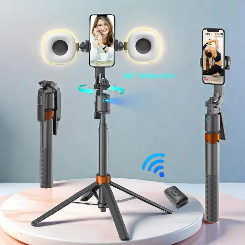 A tripod-mounted 360 degree rotatable selfie stick with face tracking and dual lights is displayed on a white surface.