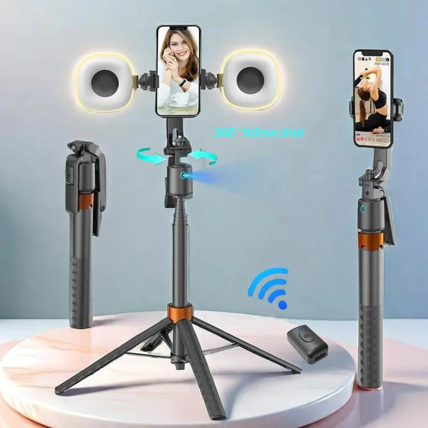 A tripod-mounted 360 degree rotatable selfie stick with face tracking and dual lights is displayed on a white surface.