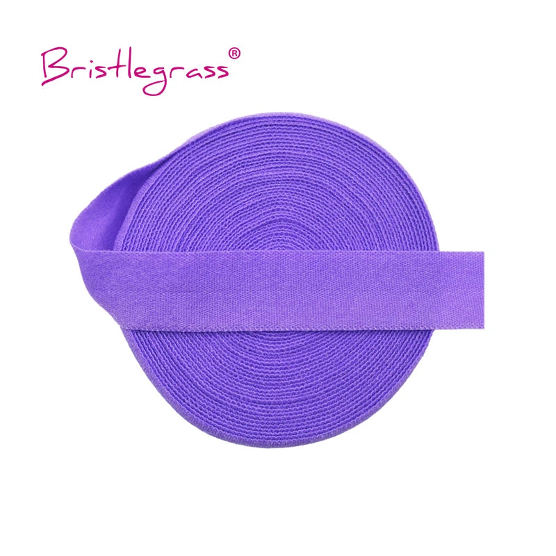 Purple bristleglass elastic hair ties and trims rolled into a band