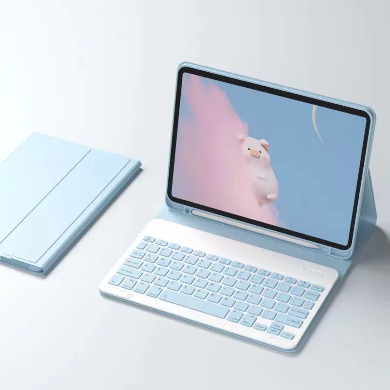 A light blue iPad 9.7-inch tablet with a detachable wireless keyboard is shown open on a white surface.