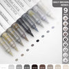 A collection of nine gray brown acrylic brush markers in various shades displayed on a white background.