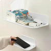 A white foldable wall shelf displaying various storage items including a box of glasses and a smartphone holder.