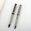 A silver and black premium metal ballpoint pen is shown diagonally on a white surface.