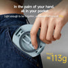 A hand holds a light gray foldable magnetic phone/tablet stand in the palm of the hand against a denim background.