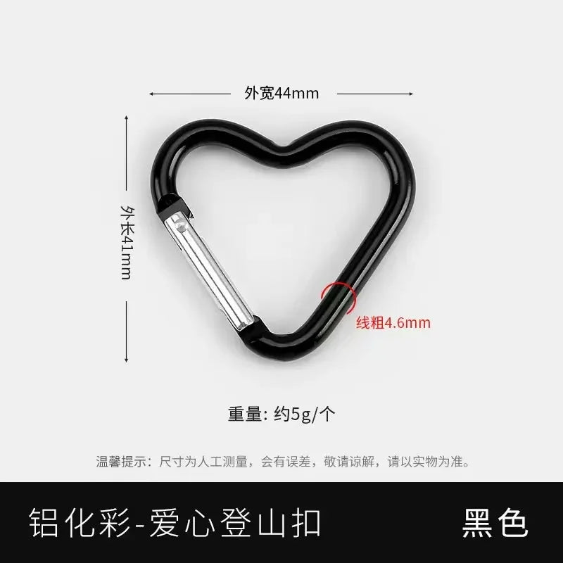 A black heart-shaped spring clasp and carabiner keychain, measuring 44mm in length.