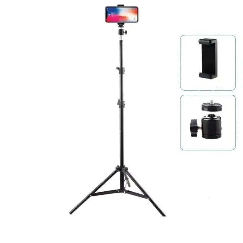 A black adjustable phone tripod with a smartphone mounted on top, used for video and selfie filming.