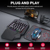 A black T-Wolf plug and play mobile gaming keyboard and mouse combo with a charging cable and a hexagonal mousepad.
