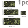 A set of three floral design mouse pads in dark green and olive tones with a non-slip rubber base.