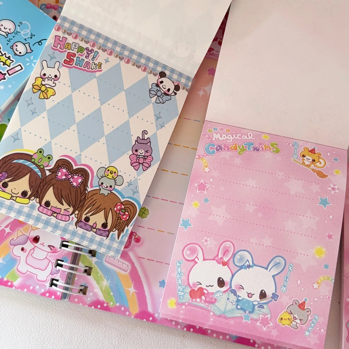 A set of colorful decorative memo pads featuring cute animal characters and pastel designs.