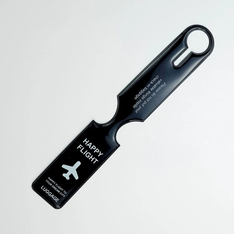 A black durable PVC luggage tag with a clip, featuring the text HAPPY FLIGHT.