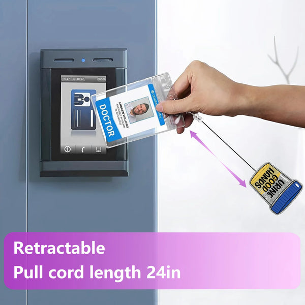 A hand is pulling a retractable badge reel with a glitter acrylic design from a slot on a gray cabinet.