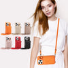 A woman holds various colored phone cases in a row against a white background.