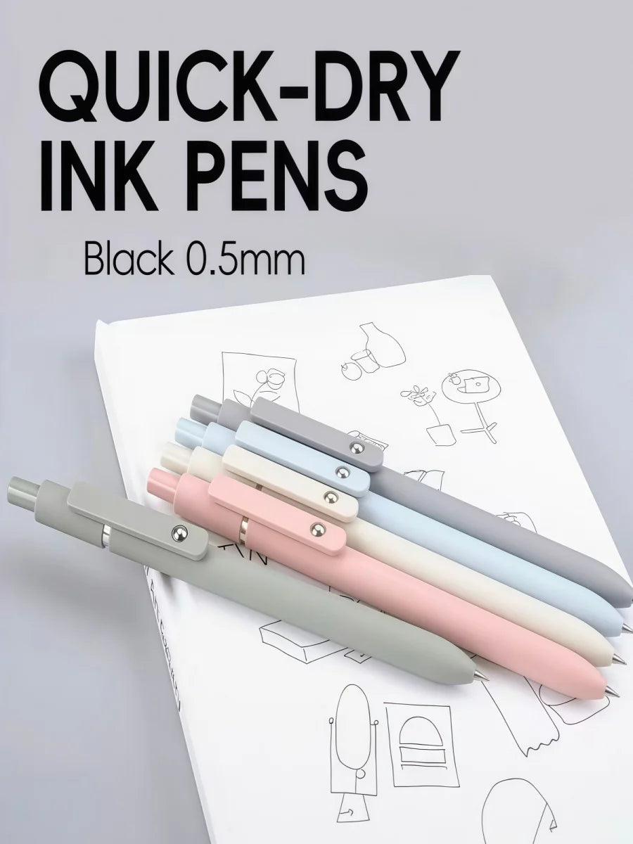 A collection of black 0.5mm quick-dry ink pens lined up on a white sheet of paper.