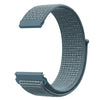 A close-up view of a gray nylon loop watch strap for kids, showing the textured material and buckle area.