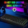 A close-up view of a black 68-key RGB gaming keyboard with vibrant green and purple lighting on a blue surface.