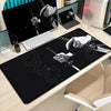Black gaming mousepad featuring an illustration of Miyamoto Musashi from the Vagabond manga.