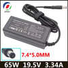 Adaptador de corriente negro de reemplazo para portátil con salida de 19.5V y 3.34A.