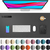 A large black desk mat featuring various color swatches for a PU leather surface.