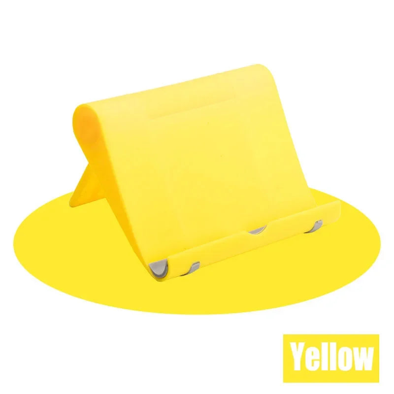 A yellow flexible multi-angle tablet and phone desk stand.
