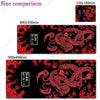 A set of three gaming desk mats featuring a red dragon design on a black background.