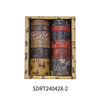 A set of vintage floral washi tape rolls displayed in a wooden box.