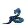 A realistic blue and green snake figurine with textured scales and an orange eye.