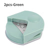 A pair of green precision corner cutters for paper and cardstock.