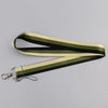 A black and olive green striped vintage cassette tape lanyard with a metal clip.