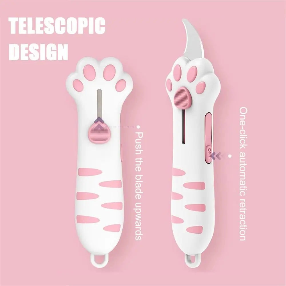 White cat paw-shaped box cutter with a titanium blade shown against a pink background.