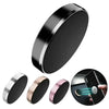 A set of magnetic car dashboard phone mounts in various finishes, including black, silver, and rose gold.