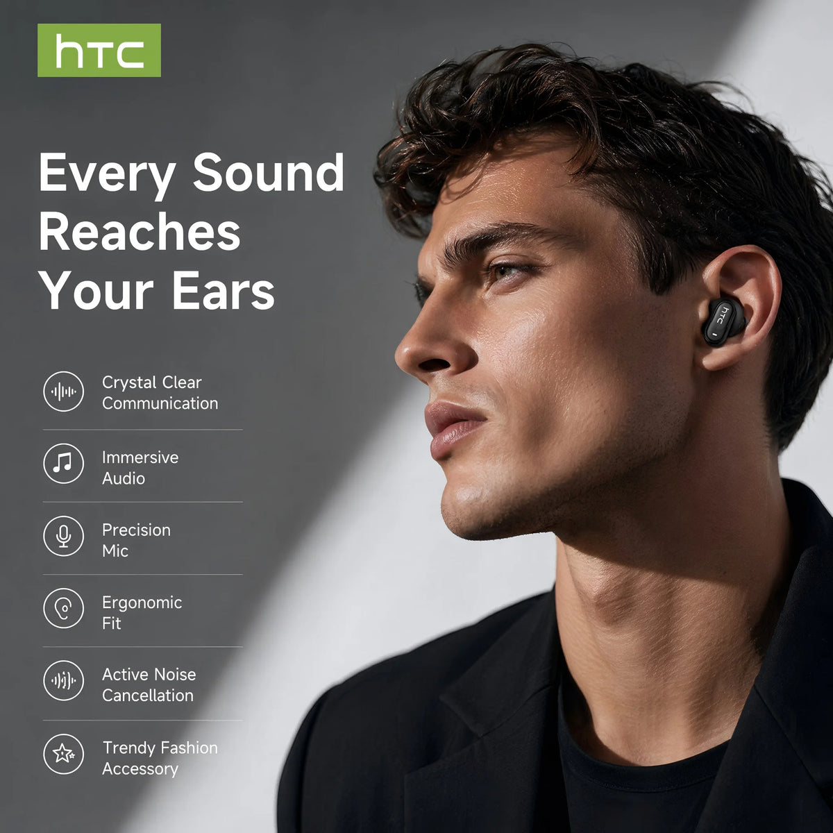 A close-up of a man wearing black True Wireless Earbuds with noise reduction technology.