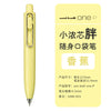 A yellow Uni-Ball One P gel pen is shown standing upright against a light yellow background.