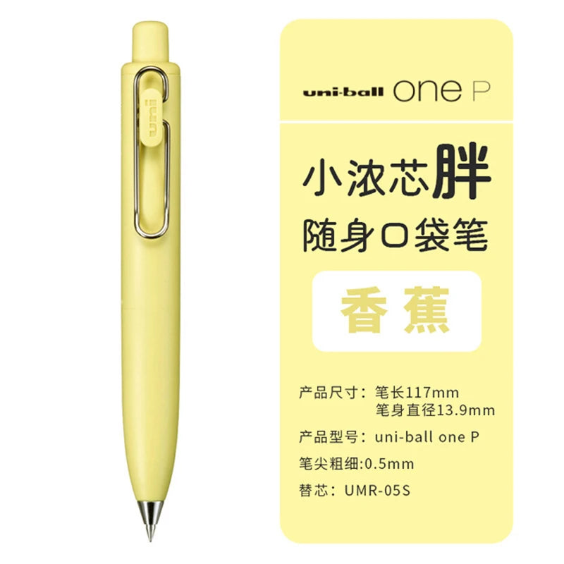 A yellow Uni-Ball One P gel pen is shown standing upright against a light yellow background.