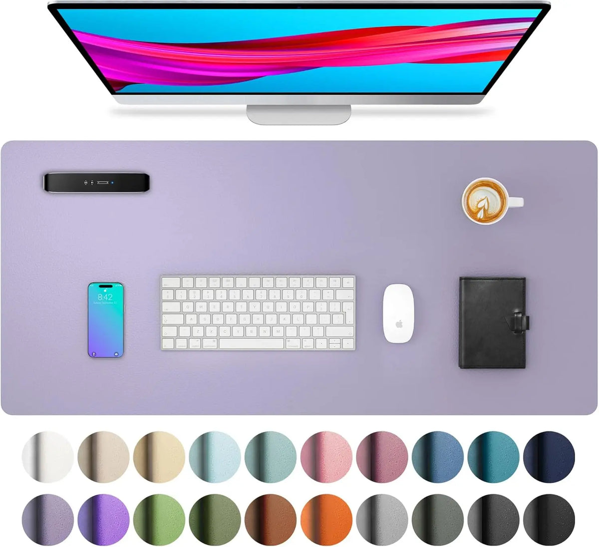 A large purple desk mat featuring various color swatches for a laptop and keyboard.