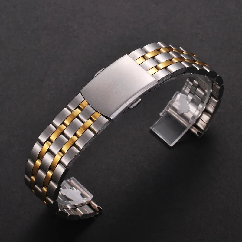 Stainless steel watch band with gold and silver stripes featuring a folding safety clasp.