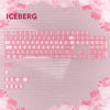 A close-up of pink and white RGB keycaps for a mechanical keyboard displayed against a light pink background.
