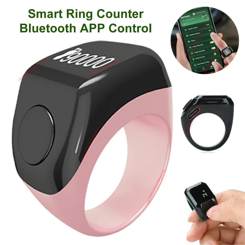 A pink smart ring counter with a black face, shown next to its packaging and on a hand.