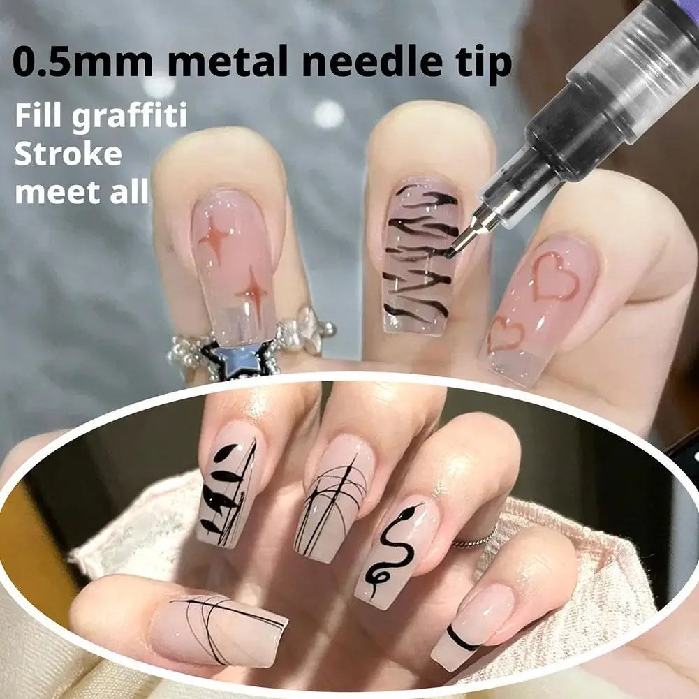 Gros plan d'une main appliquant de l'encre pour graffiti à pointe de aiguille métallique sur les ongles pour le nail art