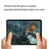 Hands holding an iPad Mini displaying a game with smooth touch and restored colors.