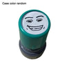 A rubber stamp with a funny meme face design on the top, colored green and white.