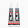 A bottle of B-7000 surprise adhesive jewelry glue with a white cap and black label.
