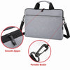 Gray ultra-thin laptop sleeve bag featuring a smooth zipper and portable buckle.
