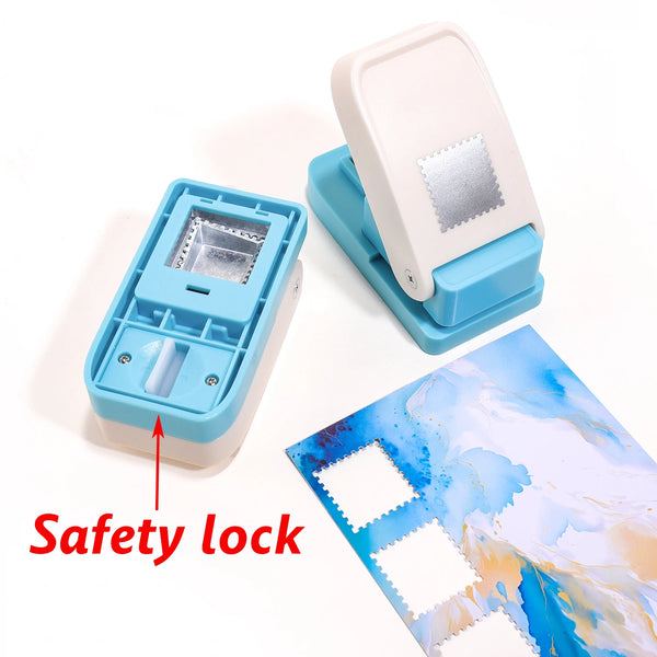 A white and blue embossing punch machine with a safety lock and a sheet of patterned paper.