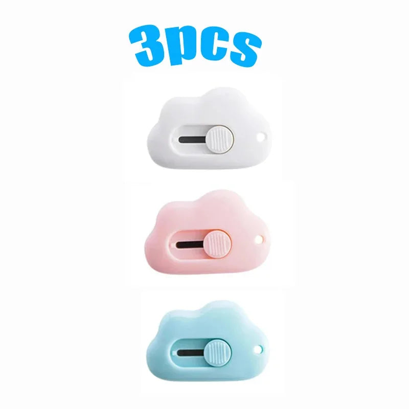 A set of three multi-color rabbit cloud utility knives in white, pink, and light blue.